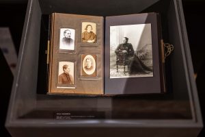 photo album in vitrine, studio photos of Julia Widgren